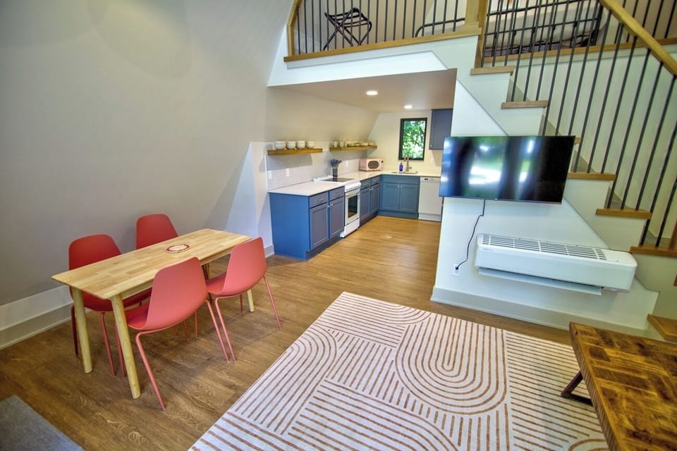 Cook and connect in the open kitchen with dining table.