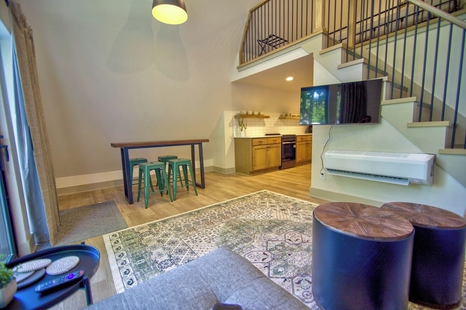 Settle in with easy seating beside the sleek kitchenette.
