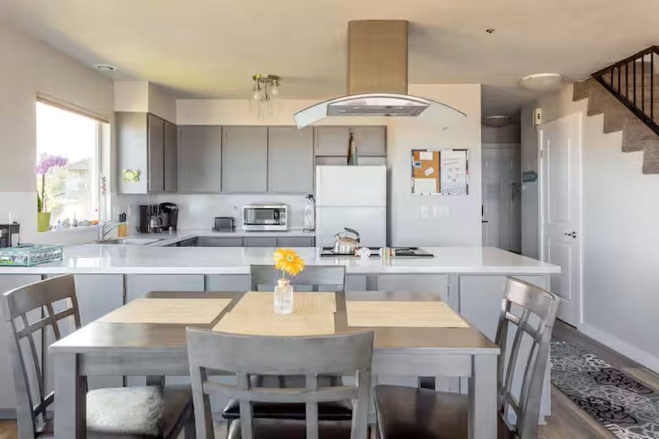 Dining room table and kitchen