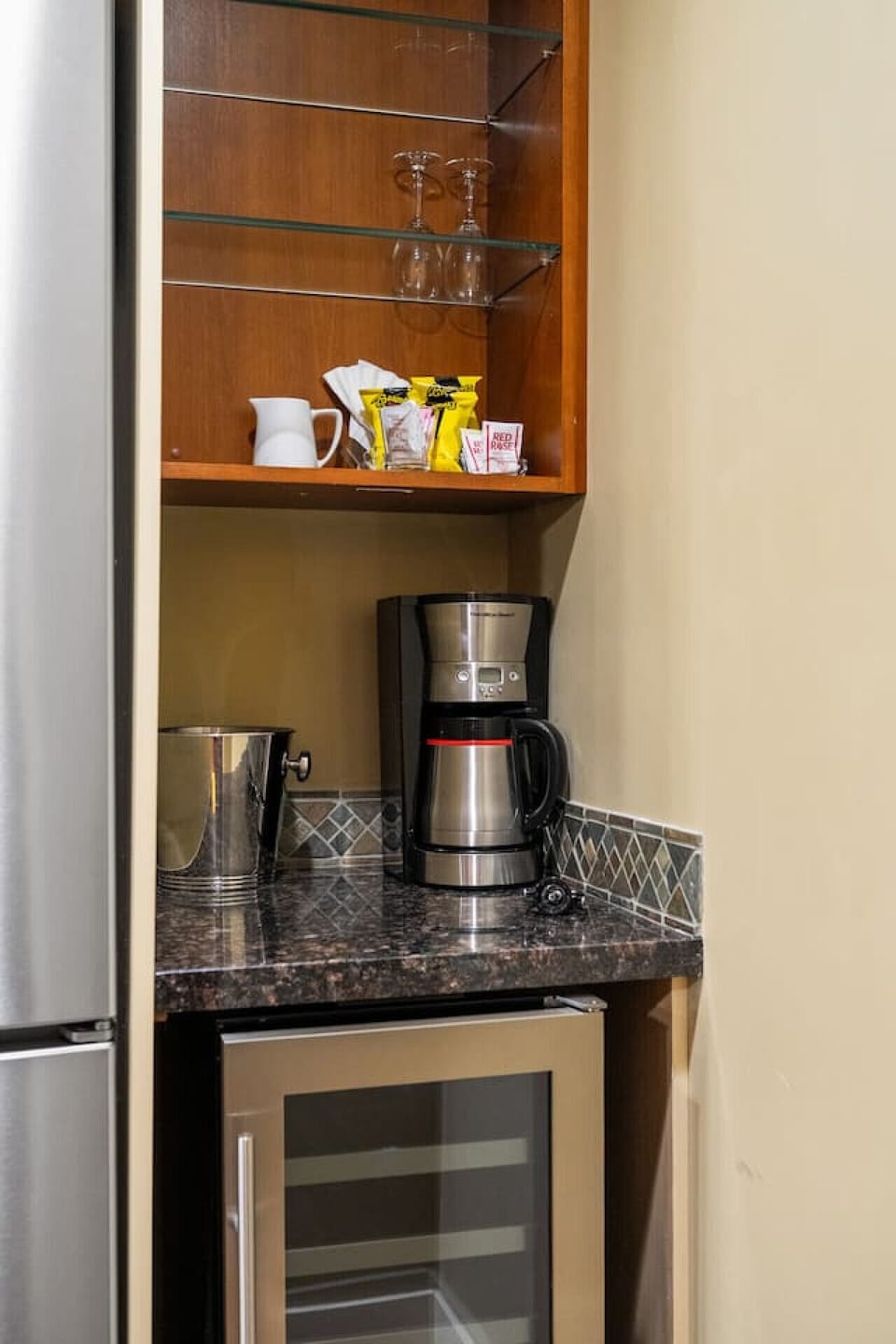 Start your day with the coffee maker, perfectly placed for your morning routine.