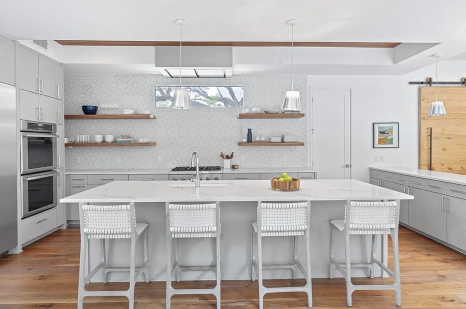 Kitchen with bar seating for the perfect place to try a new recipe