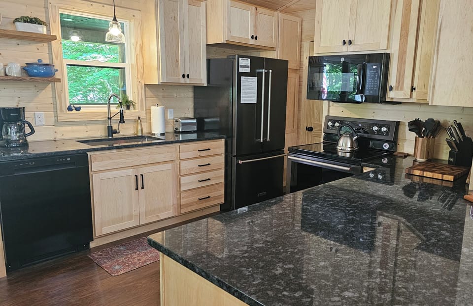 The kitchen is fully equipped with everything needed to prepare great meals.