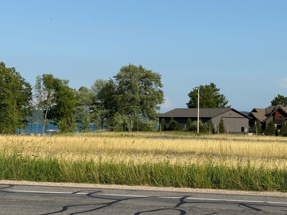 Views of Elk Lake from the front and side of the home.