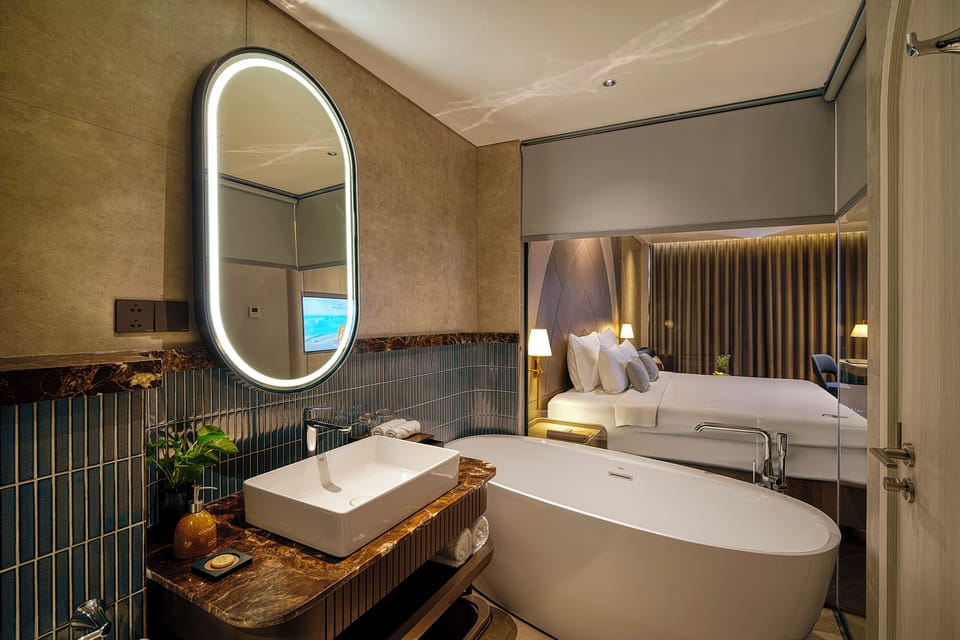 Champa Junior Suite | Bathroom | Designer toiletries, hair dryer, bathrobes, slippers