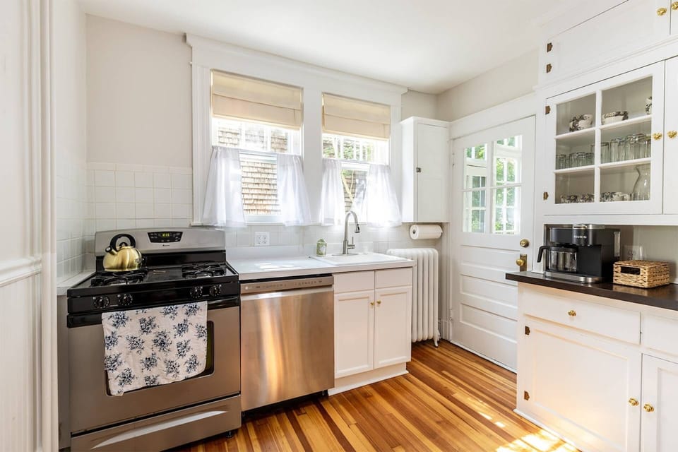 The fully-stocked kitchen has all stainless steel appliances.