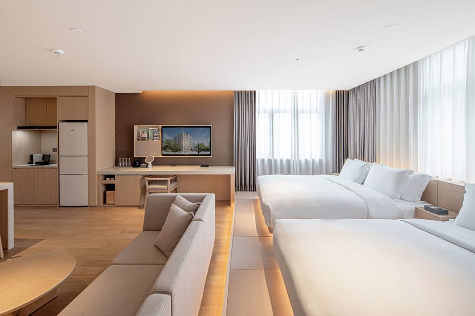 Senior Suite, 2 Queen Beds, Non Smoking, City View | Laptop workspace, blackout drapes, WiFi (free)