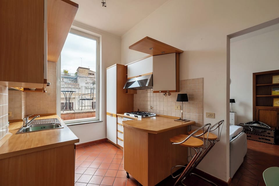 Apartment, 1 King Bed, Balcony | Private kitchen | Dining tables
