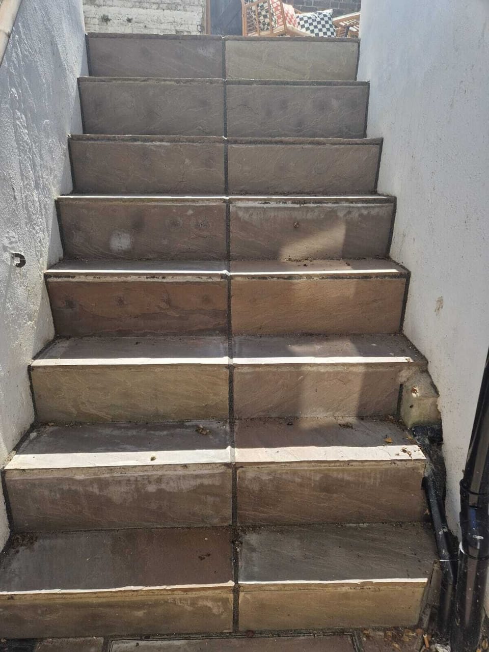 Steps up to garden / patio