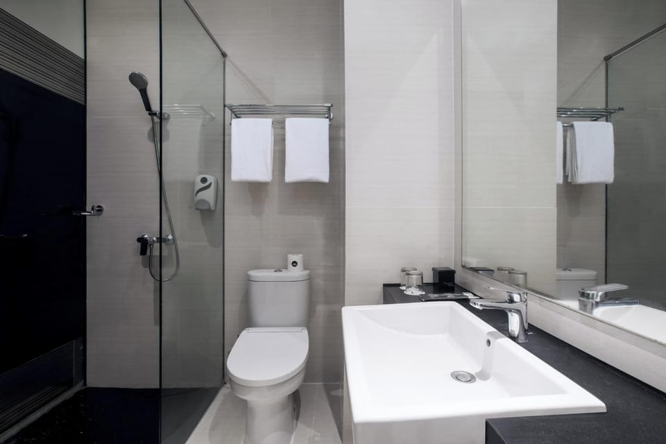 Shower, free toiletries, hair dryer, slippers