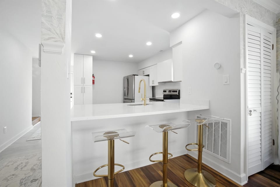 There are 3 bar stool seats at the Kitchen peninsula