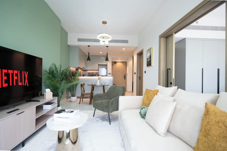 Deluxe Apartment, Balcony | Living area | 65-inch Smart TV with cable channels, Netflix, streaming services