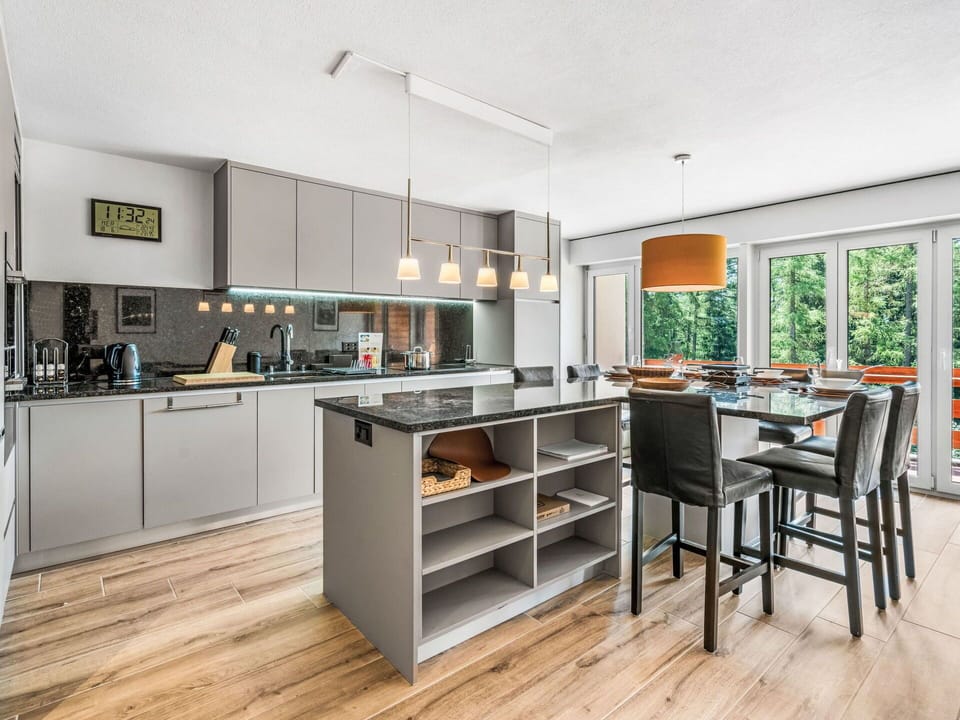Furniture, Kitchen, Countertop, Interior Design, Kitchen Appliance, Cabinetry, Flooring, Wood, Ceiling, Light Fixture