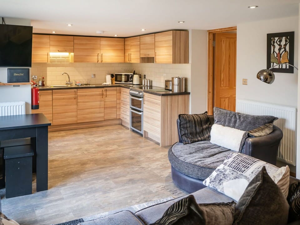 Furniture, Interior Design, Wood, Flooring, Floor, Room, Cabinetry, Ceiling, Wood Flooring, Home