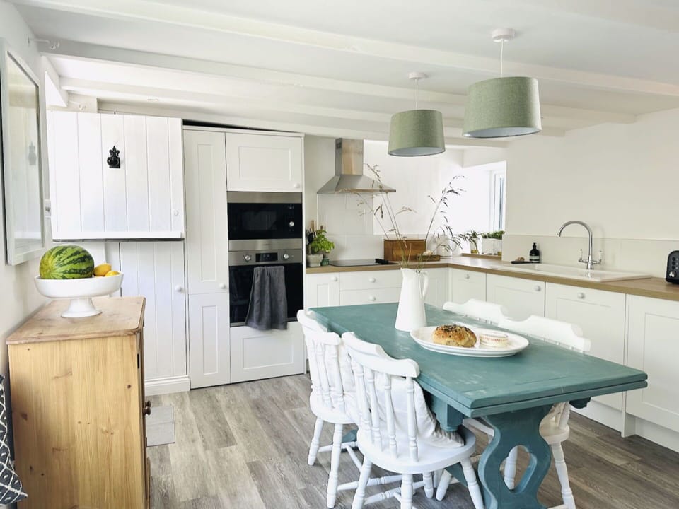 Furniture, Kitchen, Interior Design, Cabinetry, Countertop, Flooring, Wood, Ceiling, Kitchen Appliance, Floor