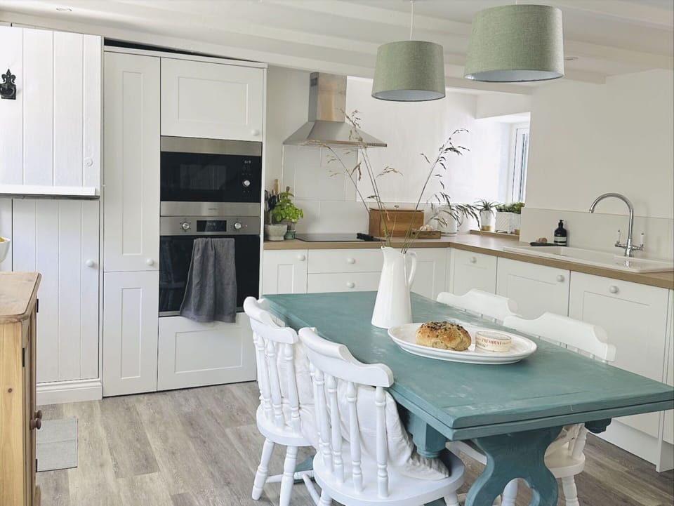 Furniture, Kitchen, Interior Design, Cabinetry, Countertop, Flooring, Wood, Kitchen Appliance, Floor, Ceiling