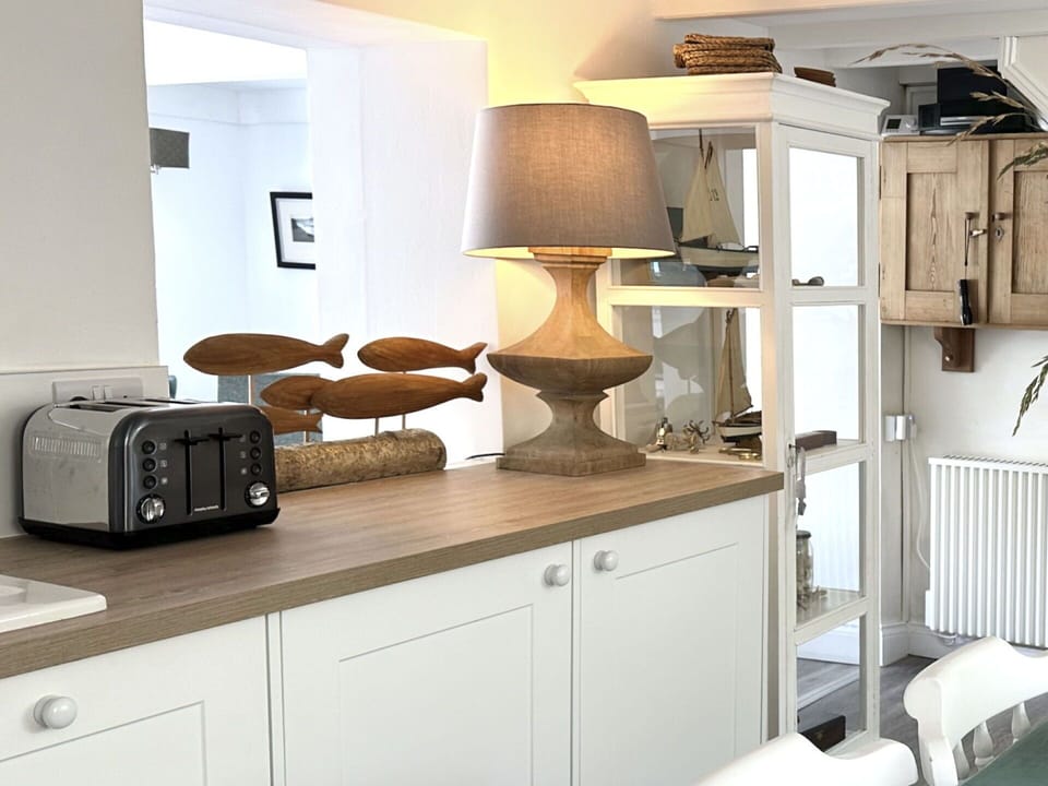 Furniture, Interior Design, Wood, Cabinetry, Shelving, Shelf, Cupboard, Lighting, Flooring, Room
