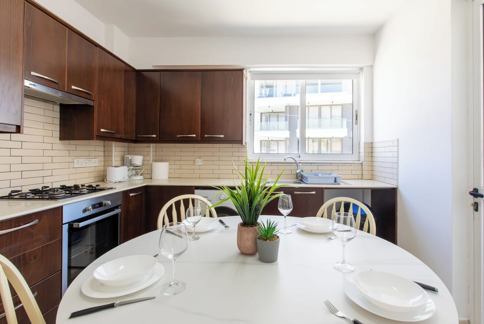 Apartment, 2 Bedrooms, City View | Private kitchen | Coffee/tea maker, full-size fridge, microwave, oven