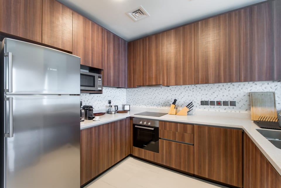 Deluxe Apartment, Sea View | Private kitchen | Coffee/tea maker, electric kettle