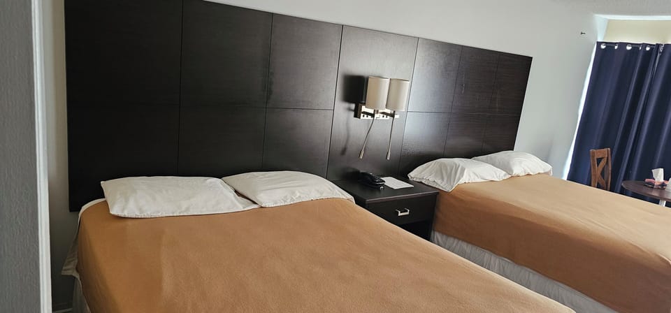 Comfort Room, 2 Double Beds, Non Smoking | In-room safe, desk, free WiFi, bed sheets