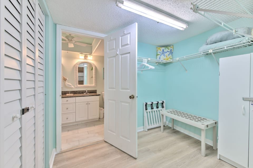 Your private laundry room keeps vacation essentials organized with convenient washing facilities and ample storage space.