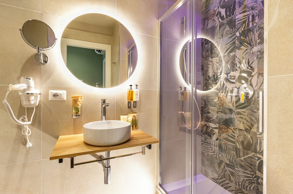 Classic Twin Room | Bathroom | Hair dryer, bidet, towels, soap