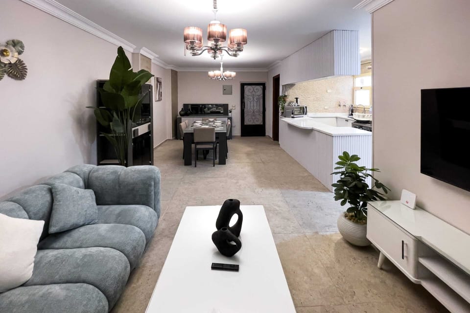 Basic Apartment | Living area | 55-inch Smart TV with satellite channels