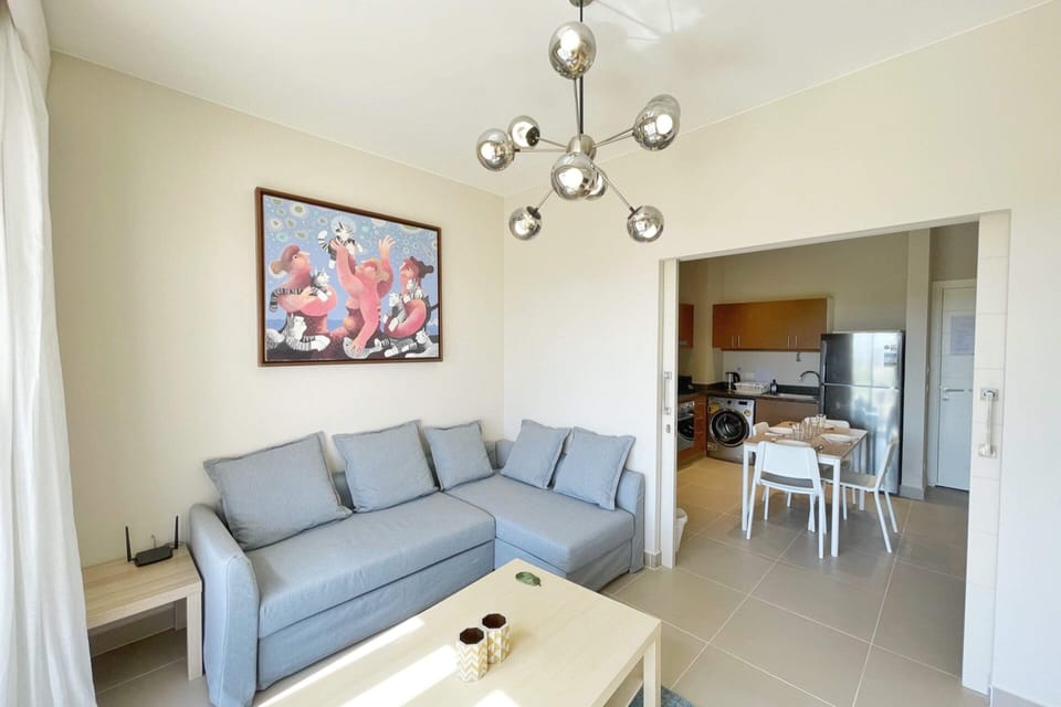 Basic Apartment | Living area | 55-inch Smart TV with satellite channels, streaming services