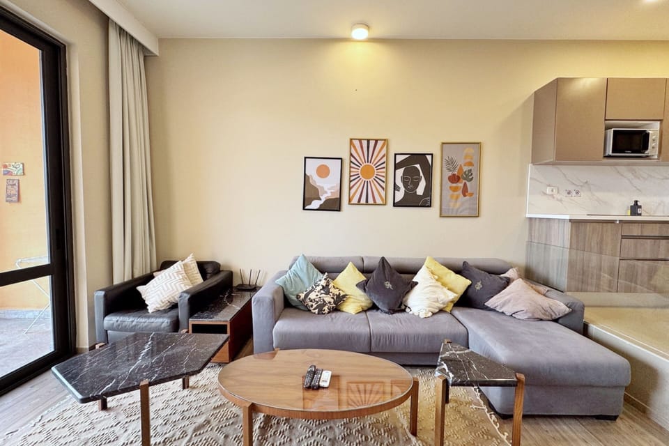 Basic Apartment | Living area | 55-inch Smart TV with cable channels