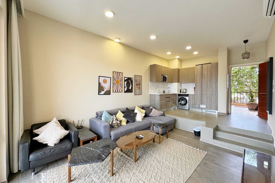 Basic Apartment | Living area | 55-inch Smart TV with cable channels