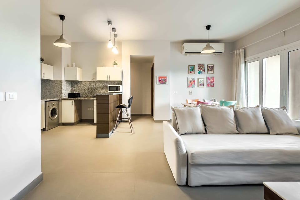 Basic Apartment | Living area | 55-inch Smart TV with cable channels