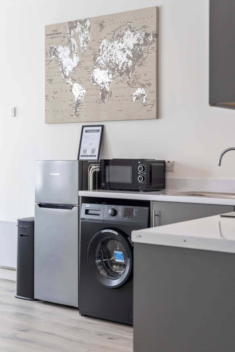 Kitchen area with washing machine