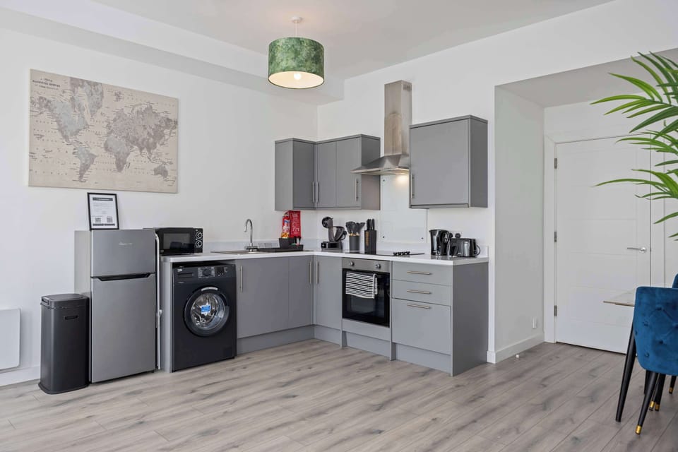 Modern fully equipped kitchen with dining area