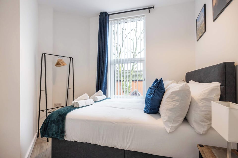 Stylish and modern bedroom with comfy hotel mattress