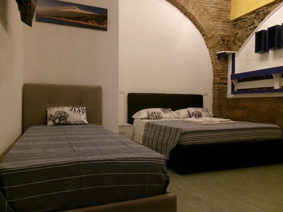 Standard Triple Room | Minibar, desk, blackout drapes, iron/ironing board (on request)