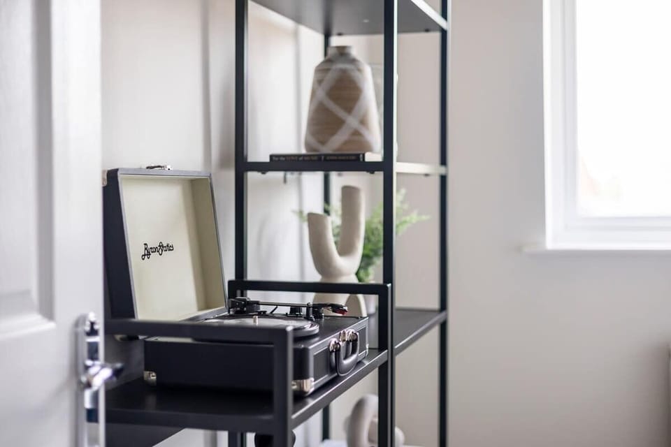 “The third bedroom offers a clean and peaceful space with a single bed and a window that lets in natural light — perfect for a restful night’s sleep.”
