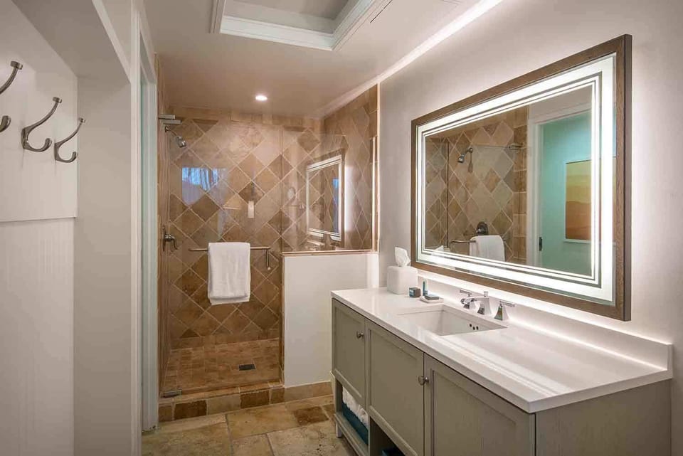 Refresh in a spa-inspired setting where clean lines, natural finishes, and soft lighting soothe the senses.