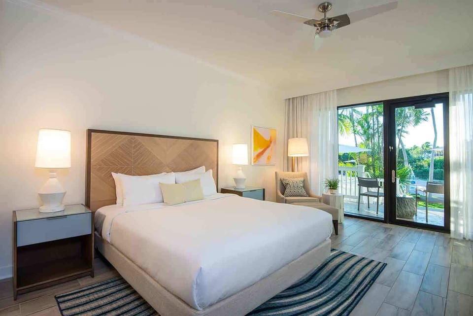 Wake to island greenery and gentle sunlight in a restful space made for slow mornings and easy evenings.