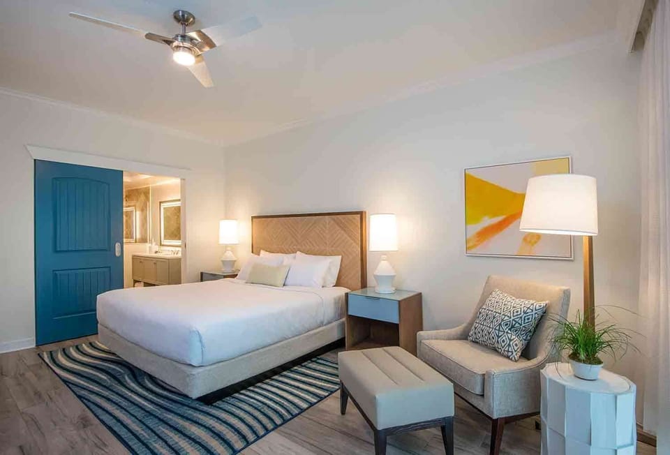 Relax into laid-back island living with cozy seating, warm wood tones, and a space that feels like home.