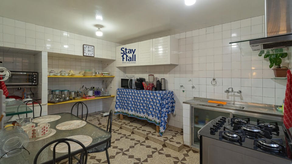 Villa | Private kitchen | Fridge, cookware/dishes/utensils