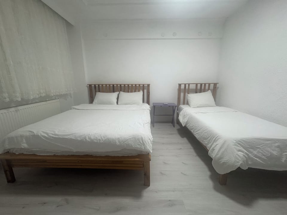 Room, Multiple Beds | Laptop workspace, free WiFi