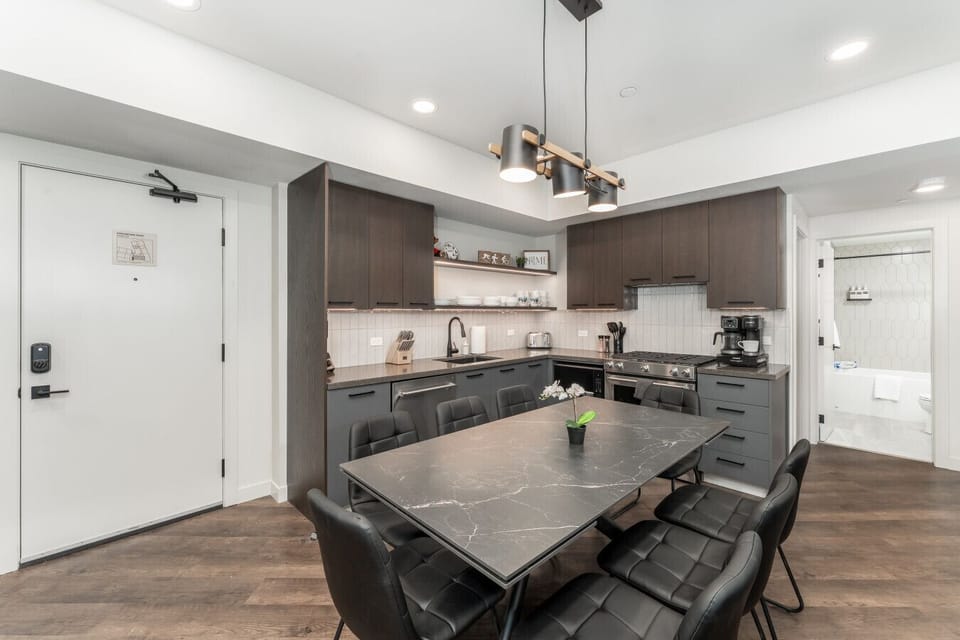 Upgraded Stainless Steel Appliances with Granite Countertops & a Gas Stove