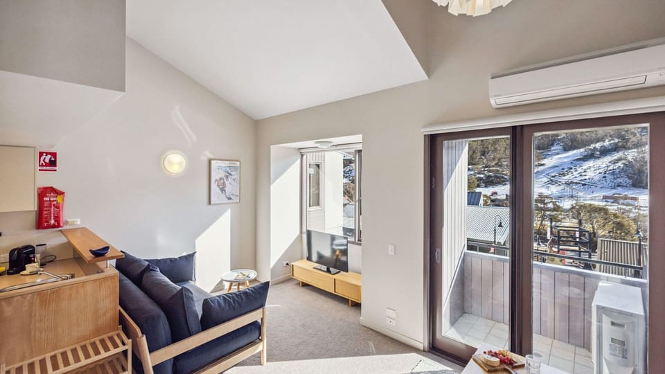 Living, balcony, dining, kitchen