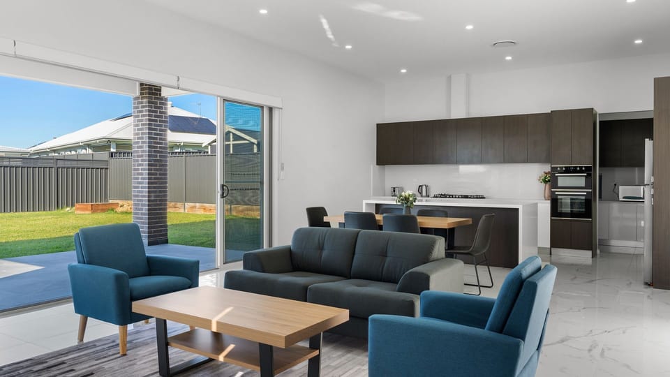 Spacious Living Room Overlooking Kitchen
