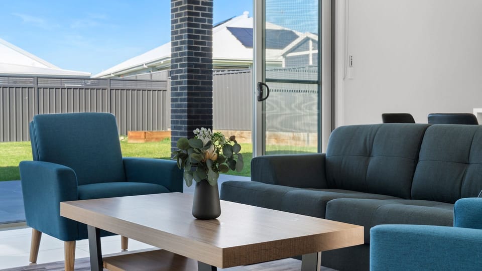 Cozy Living Area with Blue Sofa