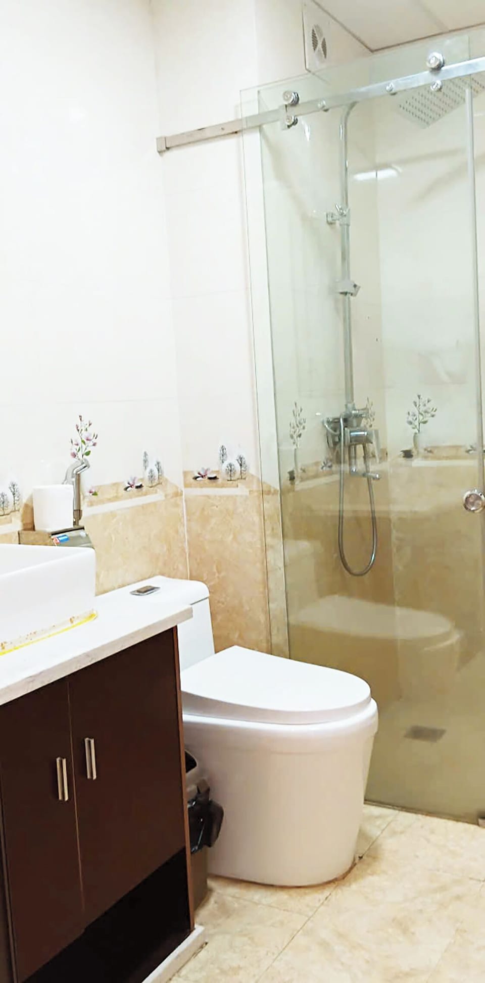 Shower, free toiletries, hair dryer, slippers