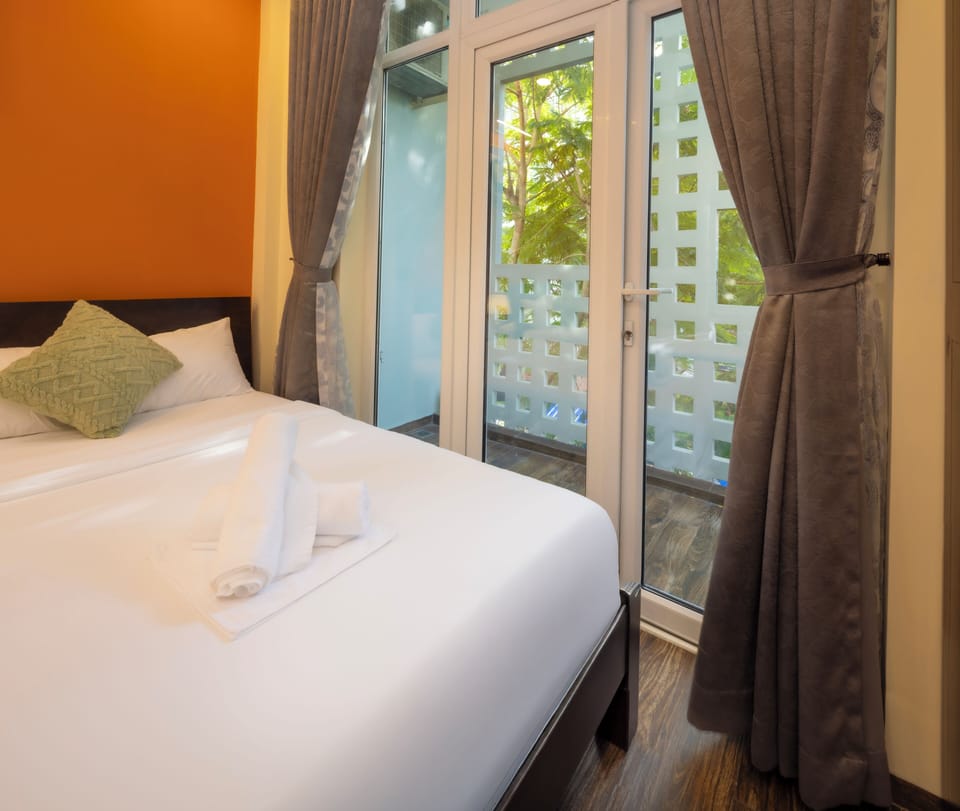 Family Quadruple Room | Desk, blackout drapes, soundproofing, iron/ironing board