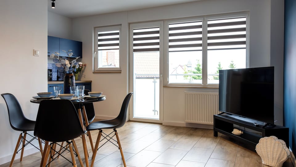 Apartament (E8) | Living area | Flat-screen TV