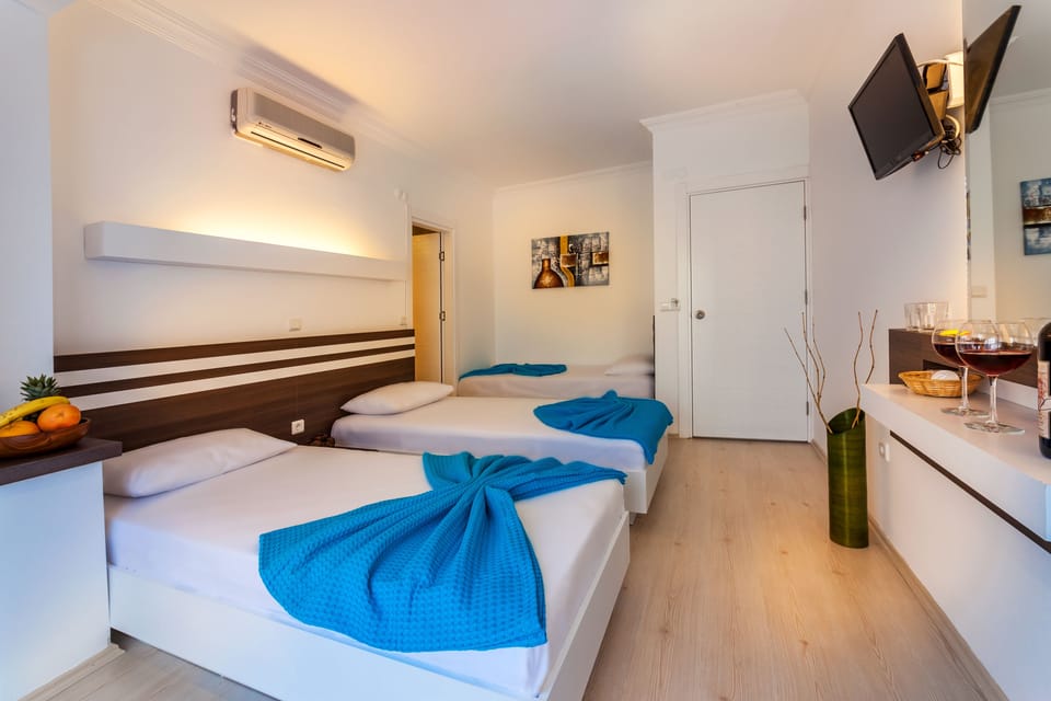Standard Triple Room | Premium bedding, iron/ironing board (on request), cribs (free)