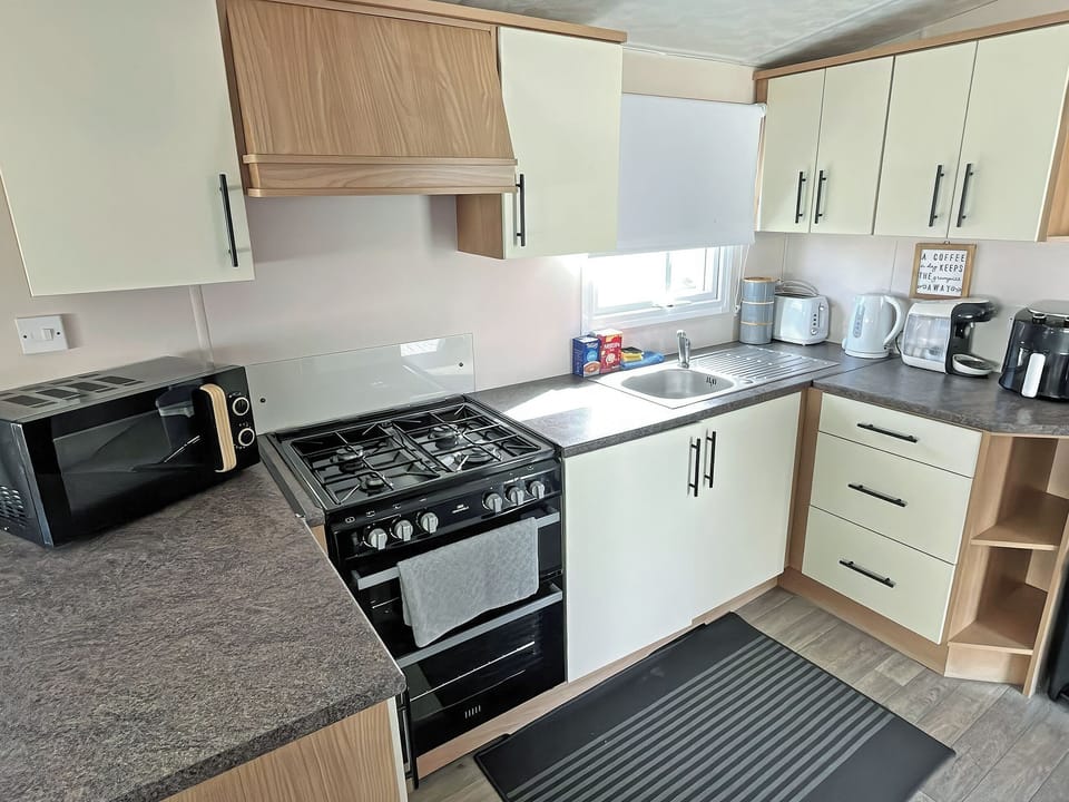 Kitchen area | Black Sheep Retreat, Rhyl, near Towyn