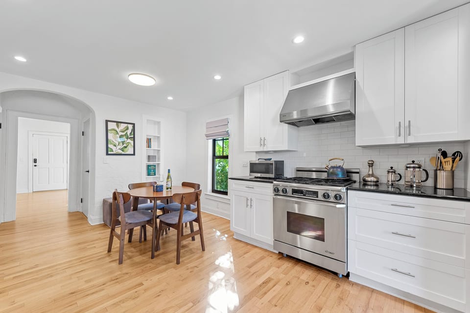 Kitchen: Bright and airy space with modern appliances, perfect for culinary adventures!